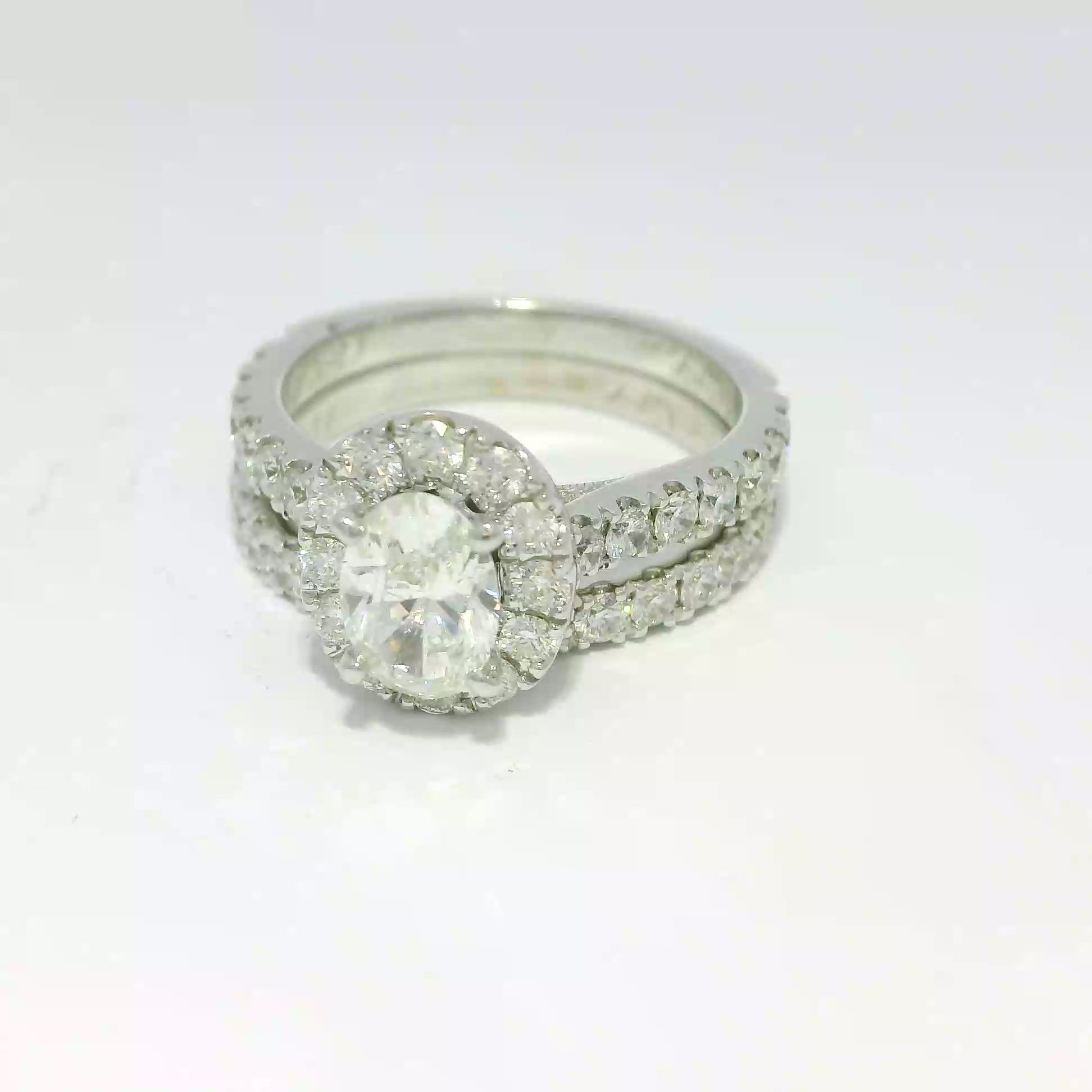 Oval Brilliant Diamond Halo Engagement Ring and Wedding Band Set in White Gold