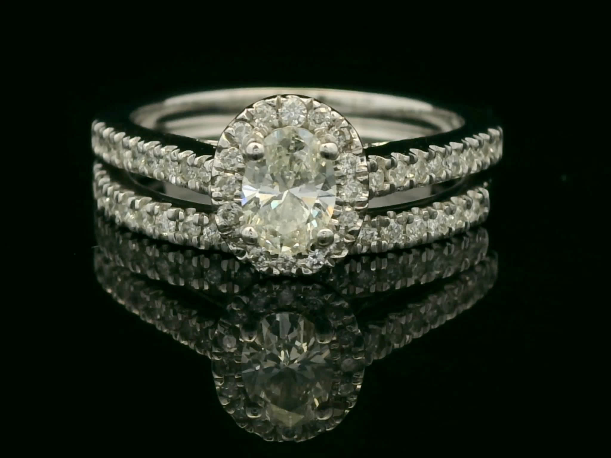 Oval Brilliant Diamond Halo Engagement Ring with Pavé Wedding Band in