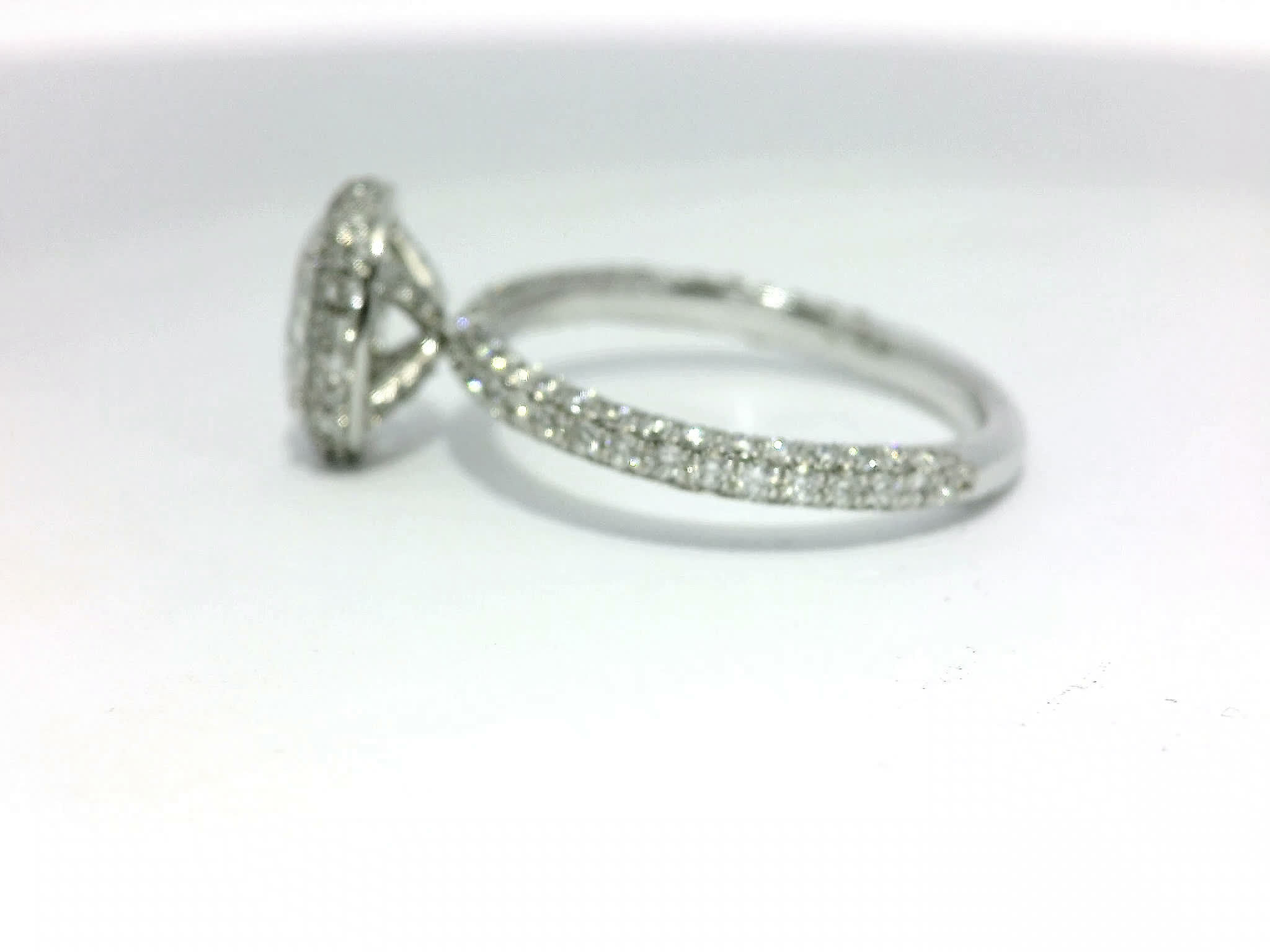 Oval Brilliant Cut Diamond Halo Engagement Ring in White Gold