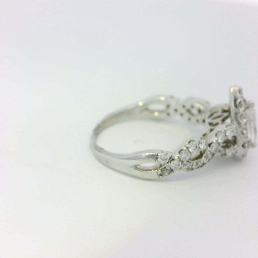 Thumbnail: Pear Cut Diamond Halo Engagement Ring in White Gold with Infinity Shank