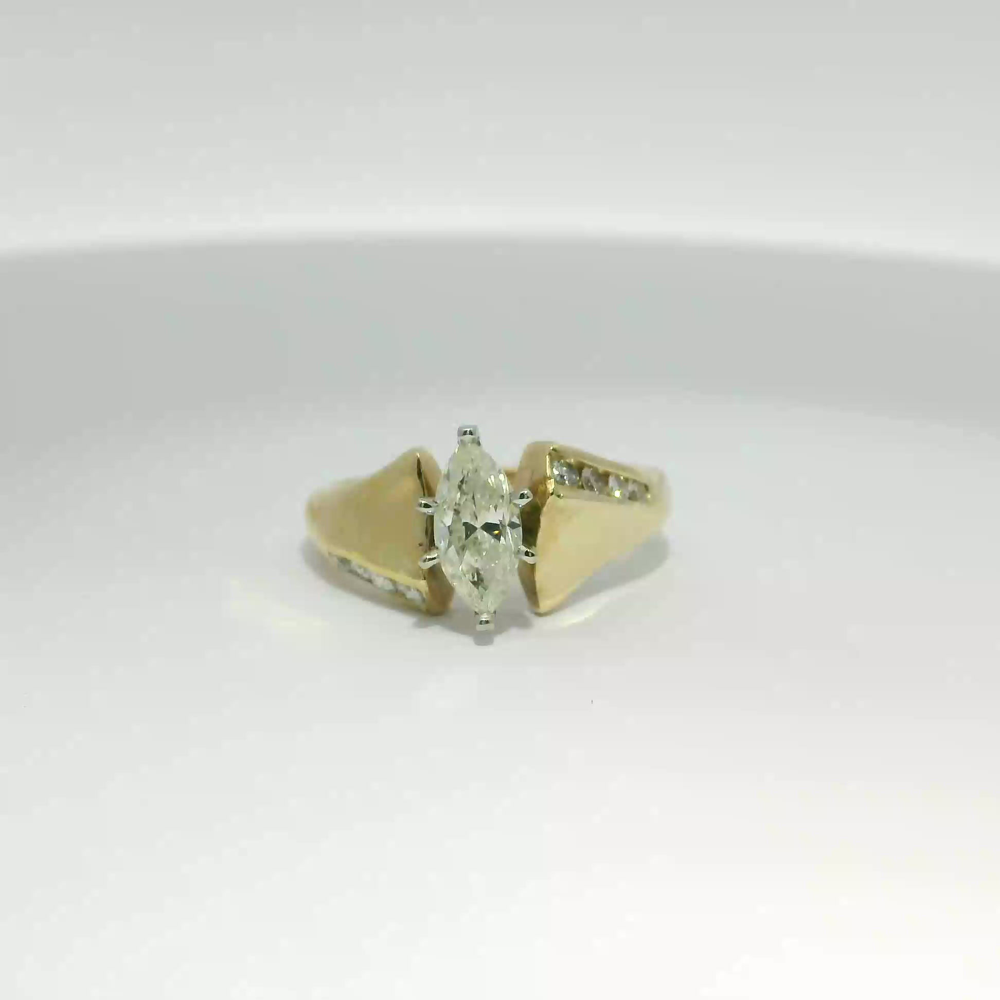 Marquise Brilliant Diamond Engagement Ring in Yellow Gold with Channel-Set