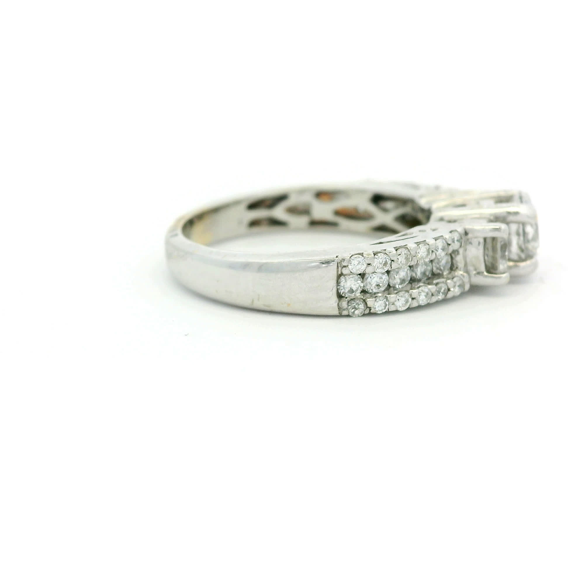 Round Brilliant Three-Stone Diamond Accent Ring in White Gold