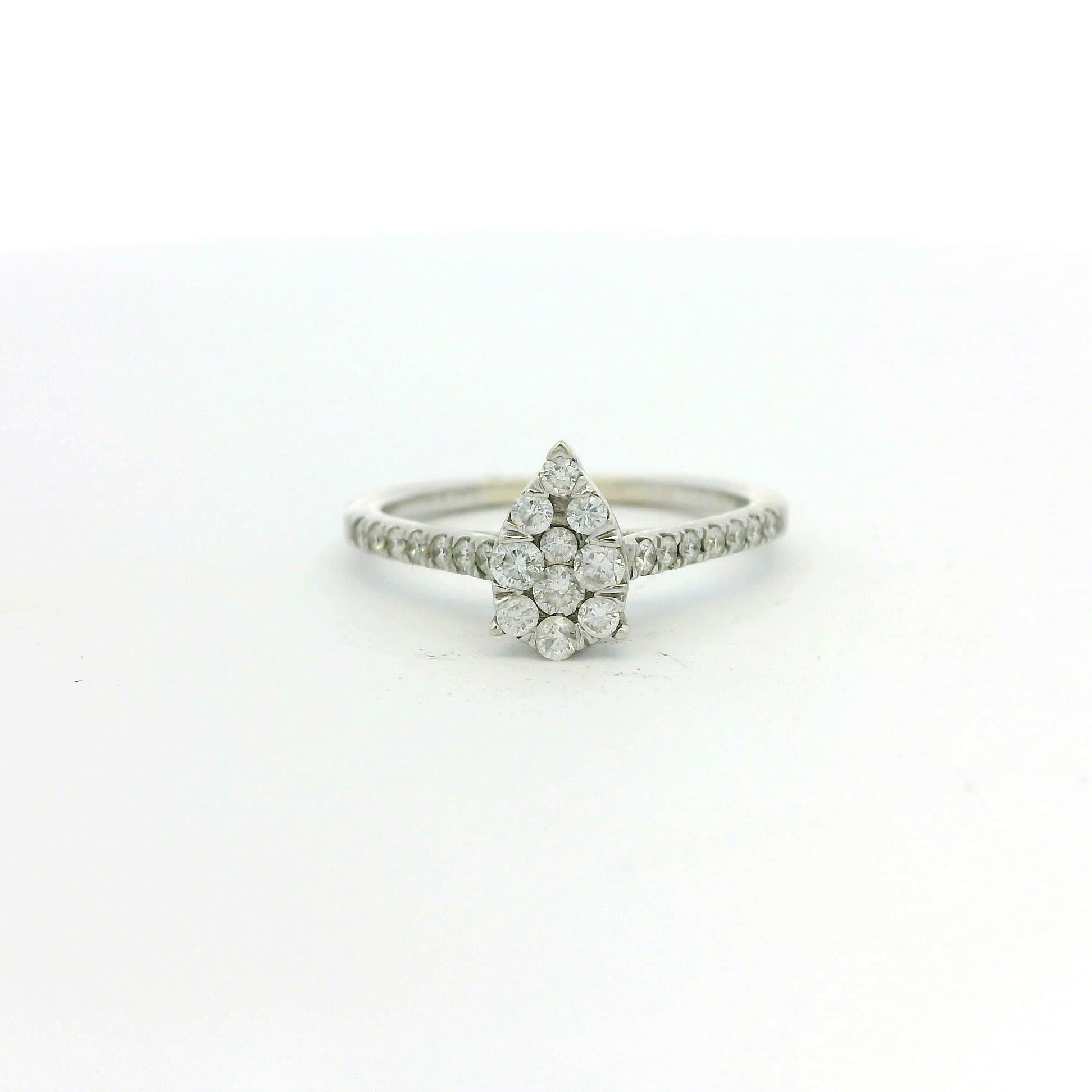 Pear-Shaped Diamond Cluster Ring in White Gold Pave Band