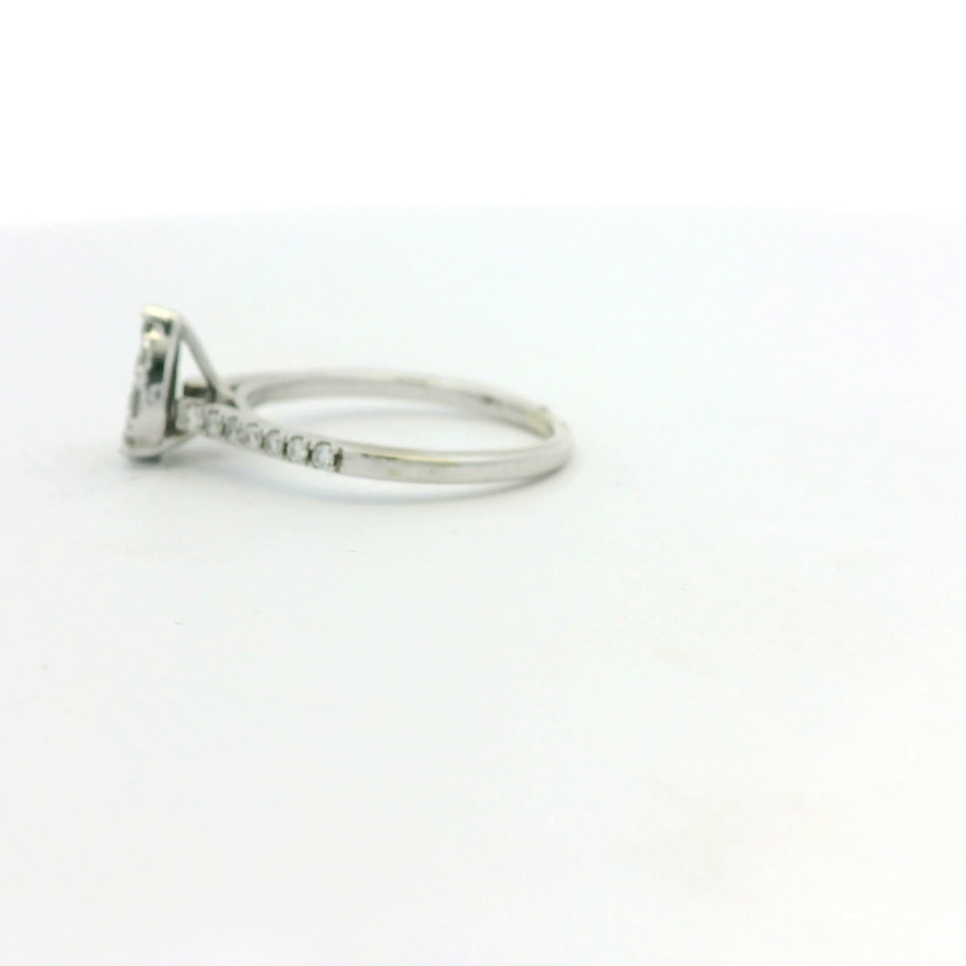 Pear-Shaped Diamond Cluster Ring in White Gold Pave Band