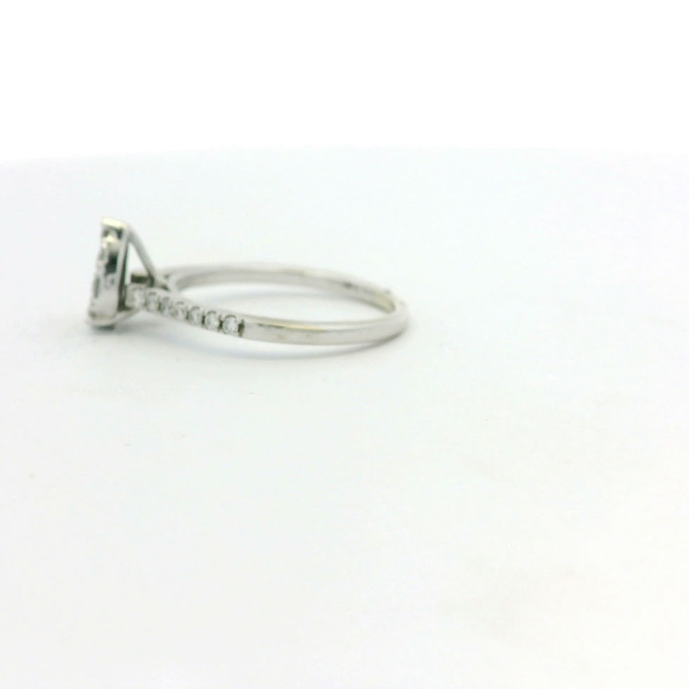 Thumbnail: Pear-Shaped Diamond Cluster Ring in White Gold Pave Band