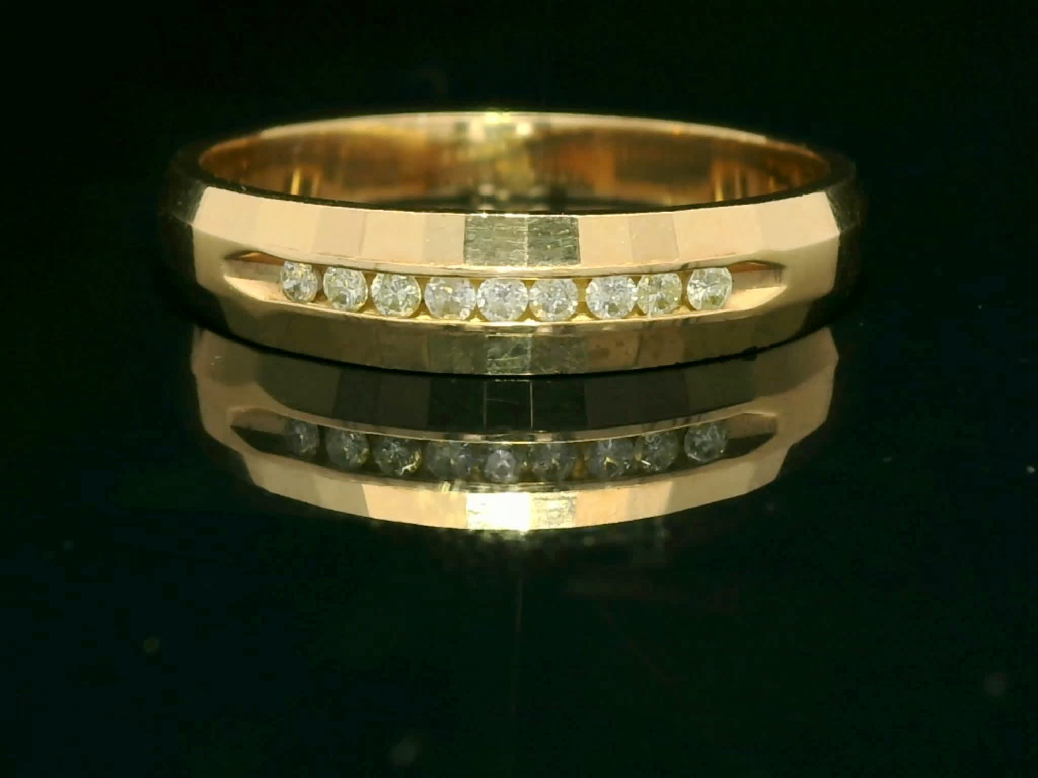 Faceted Yellow Gold Diamond Channel Set Wedding Band
