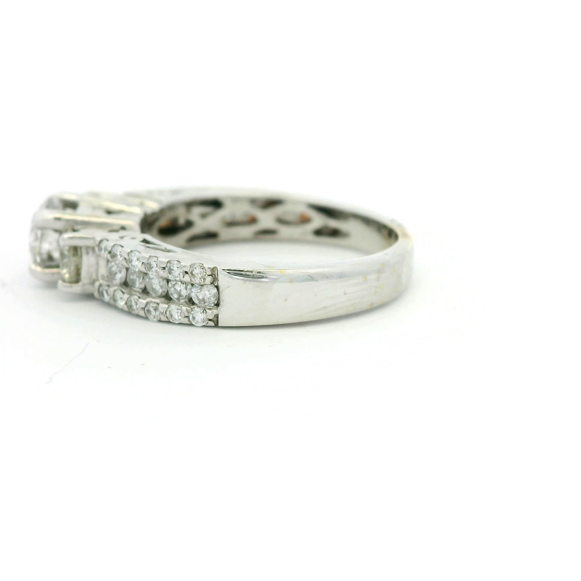 Round Brilliant Three-Stone Diamond Accent Ring in White Gold