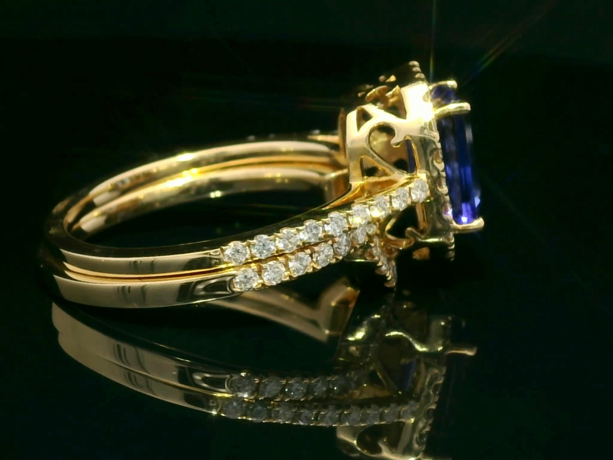 Emerald-Cut Tanzanite Halo Ring in Yellow Gold with Diamond Accents