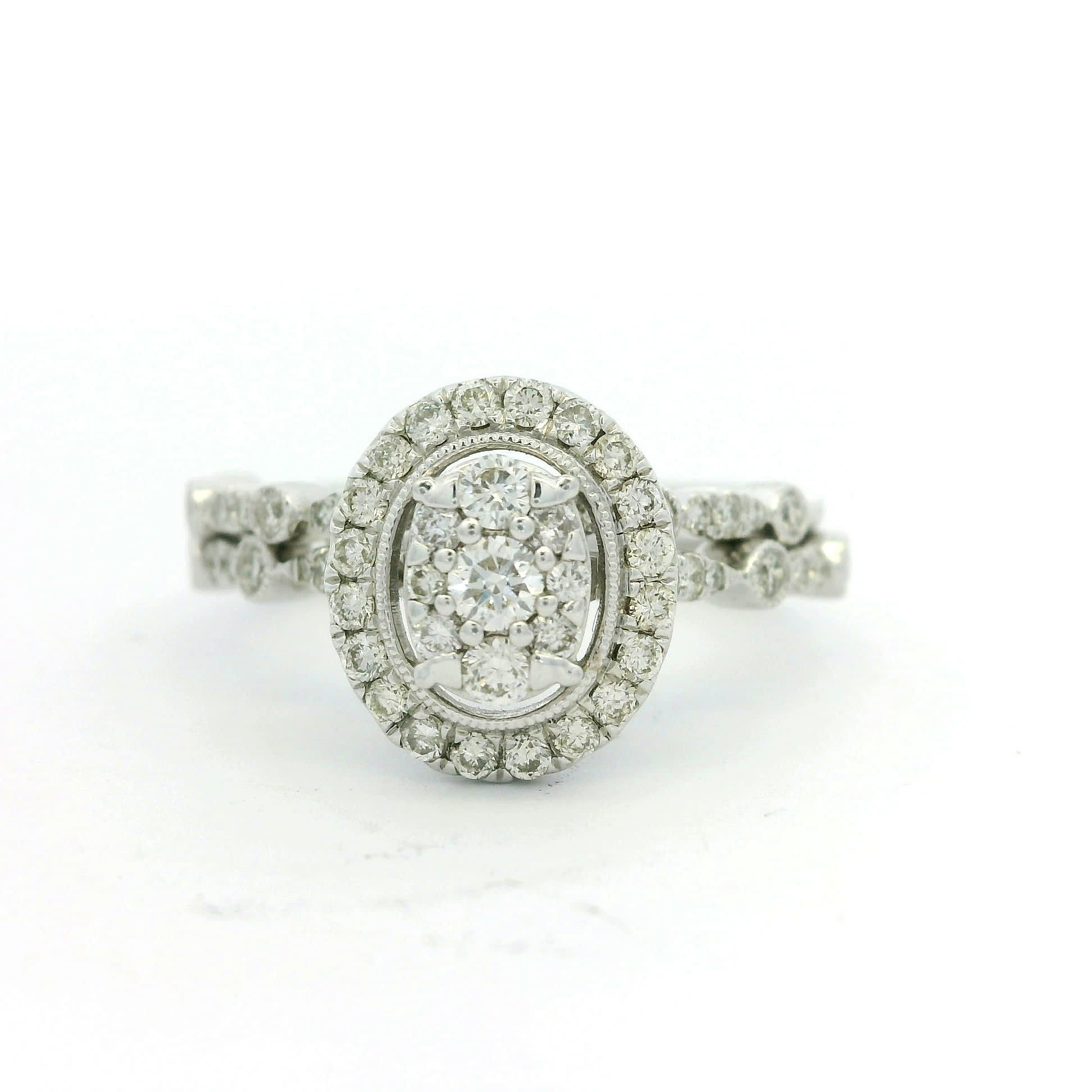 Oval Cluster Diamond Halo Ring in White Gold with Scalloped Shank