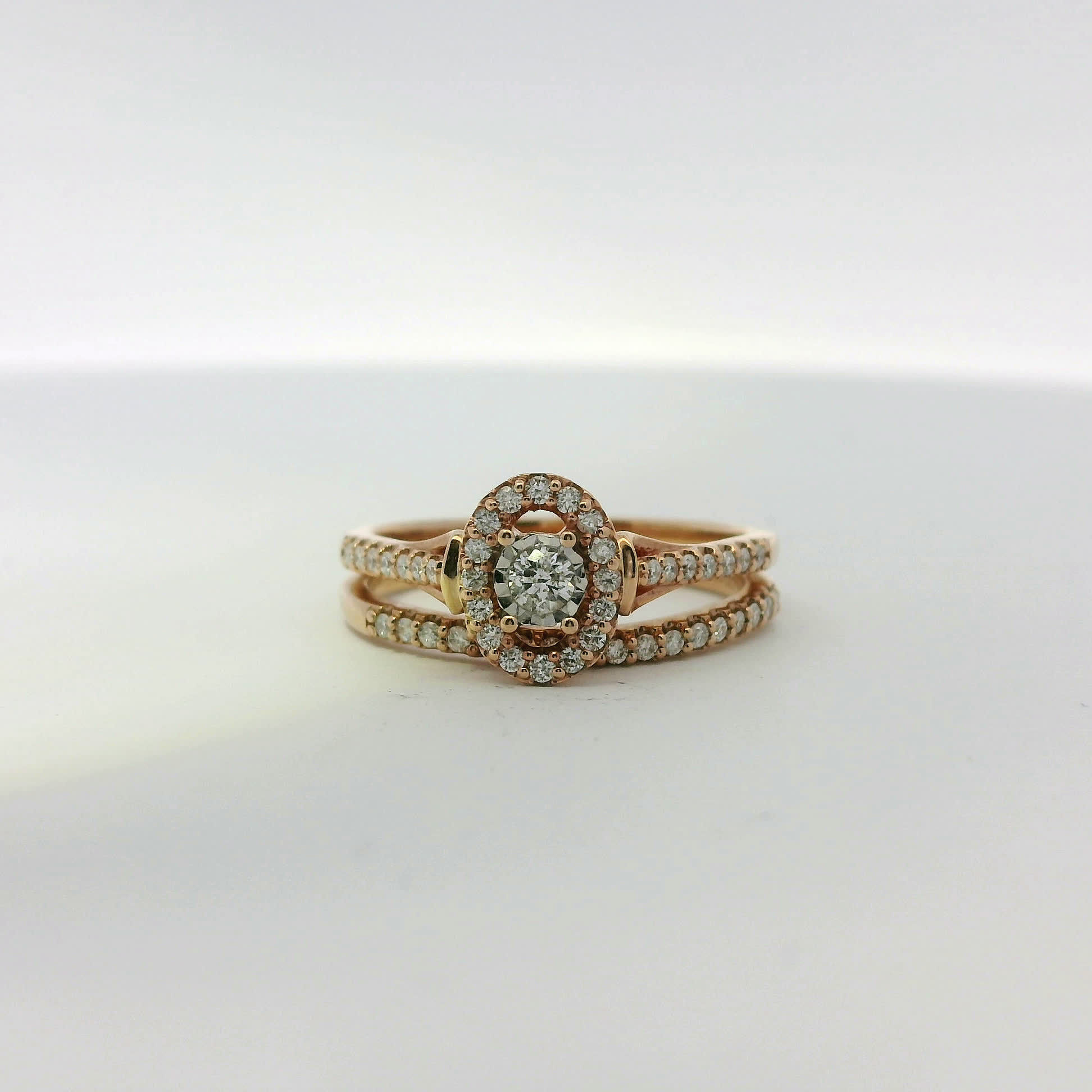 Rose Gold Round Cut Diamond Halo Engagement Ring and Wedding Band Set