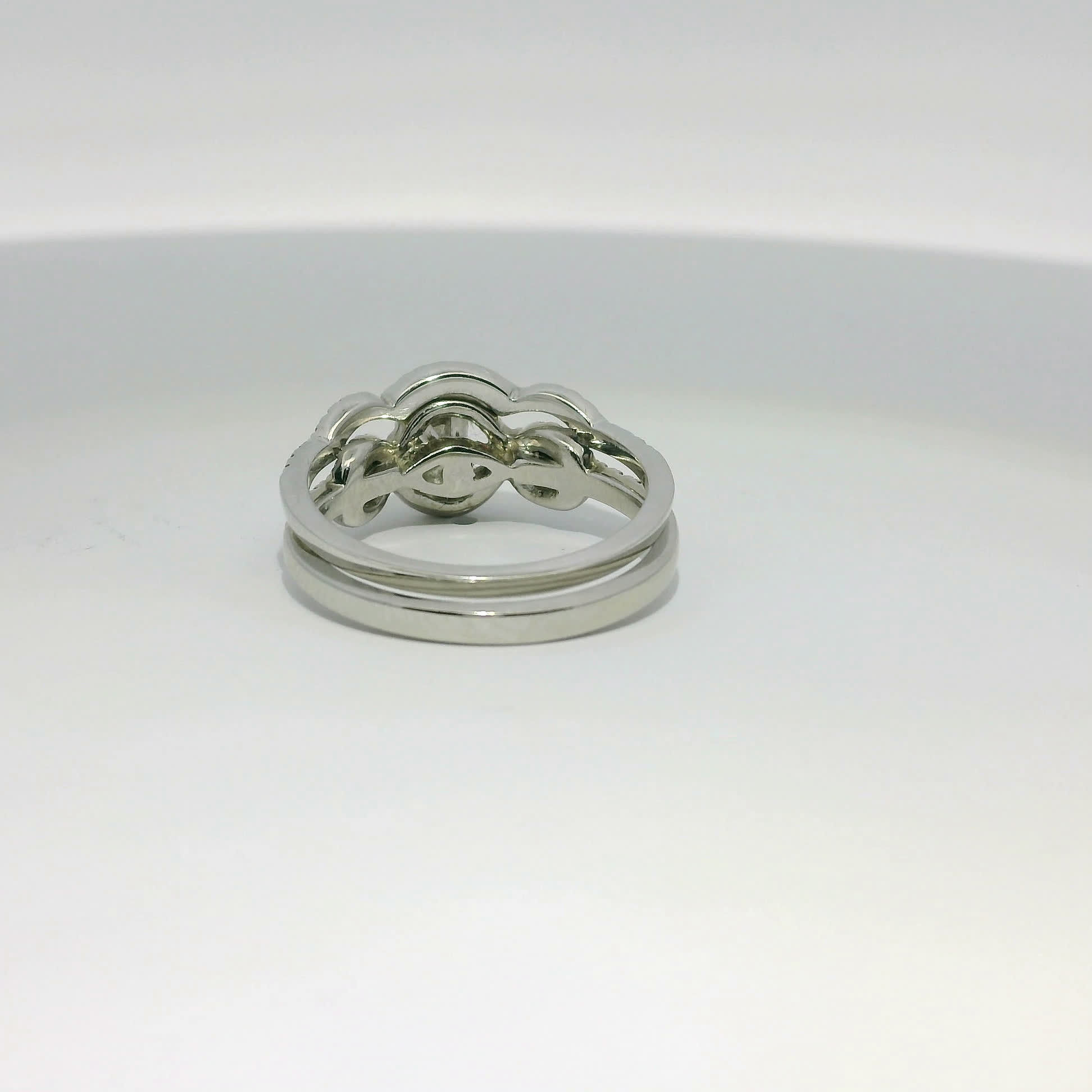 Round Brilliant Diamond Infinity Halo Bridal Set in White Gold
