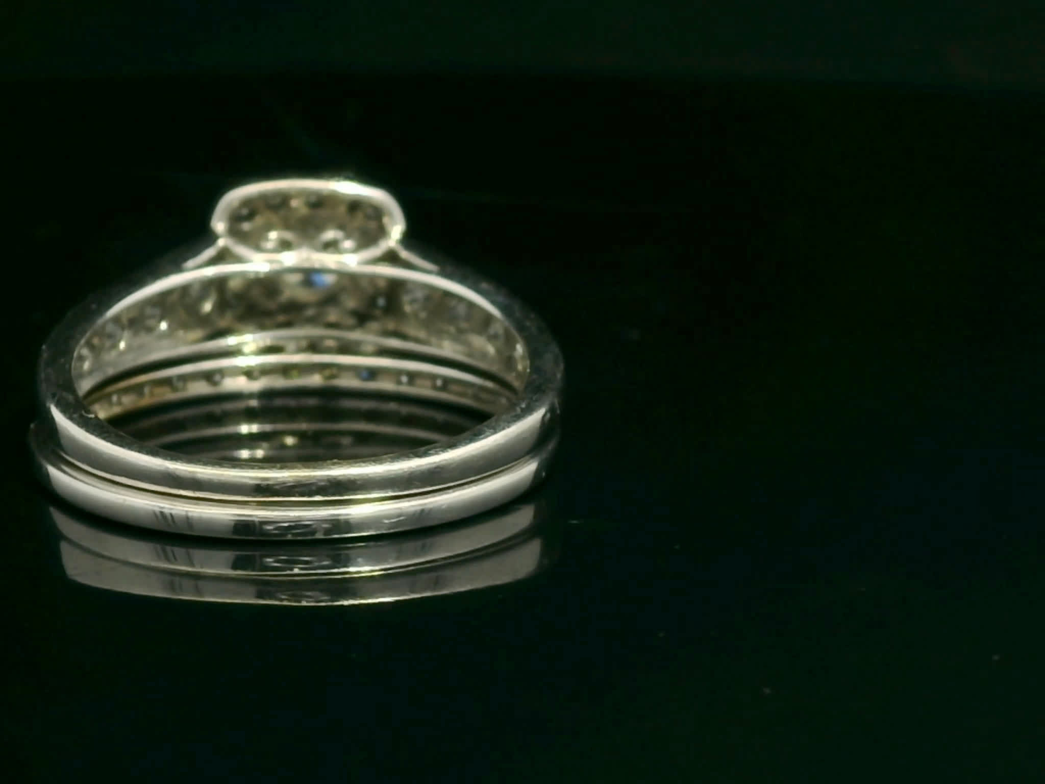 Round Brilliant-Cut Diamond Halo Engagement Ring in White Gold with Contoured