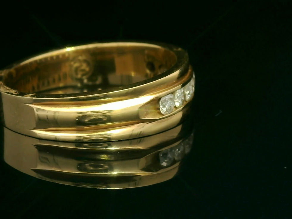 Thumbnail: Classic Channel-Set Round Brilliant Diamond Band in 18k Yellow Gold