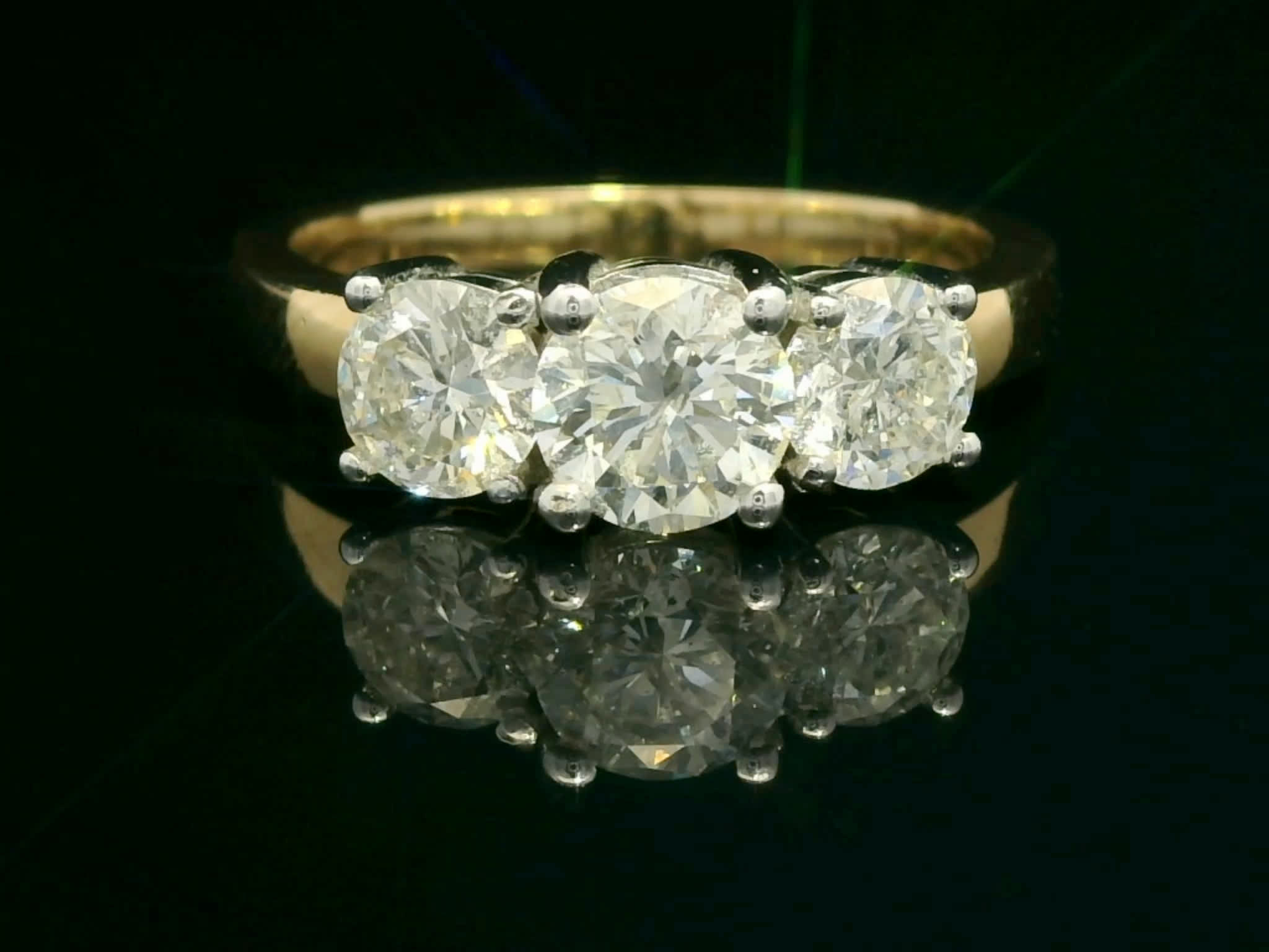 Classic Three-Stone Round Brilliant Diamond Anniversary Ring in Yellow Gold