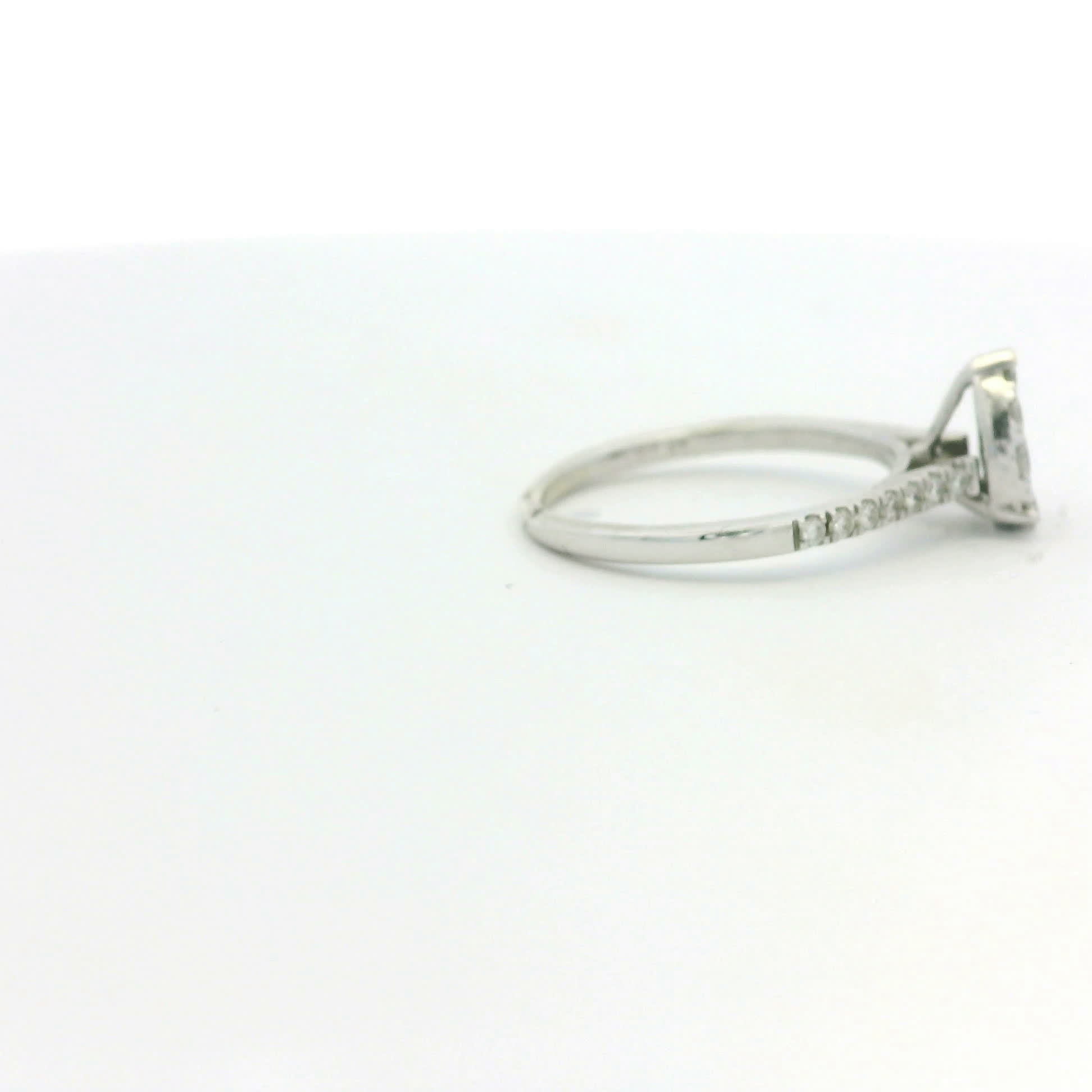 Pear-Shaped Diamond Cluster Ring in White Gold Pave Band
