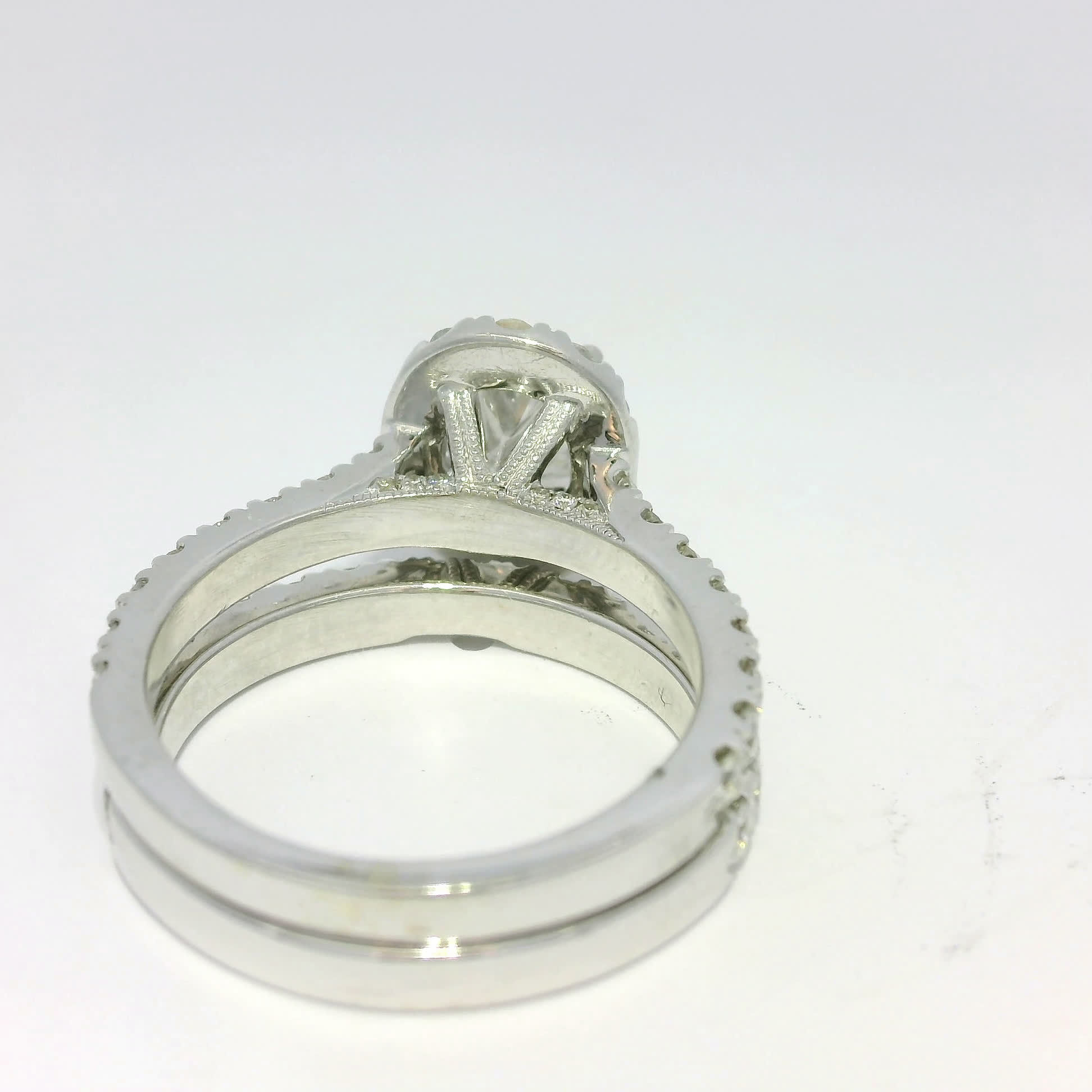 Oval Brilliant Diamond Halo Engagement Ring and Wedding Band Set in White Gold