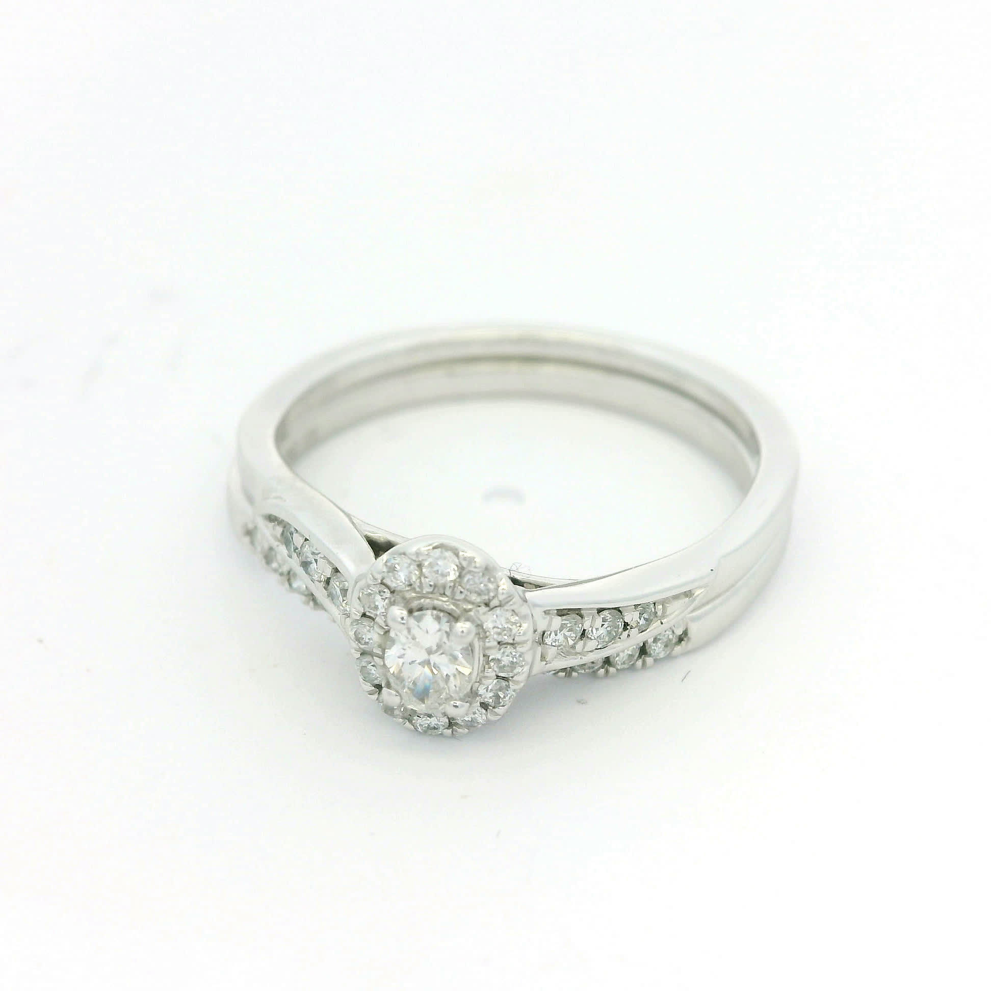 Oval Brilliant Cut Diamond Halo Engagement Ring and Wedding Band Set in White