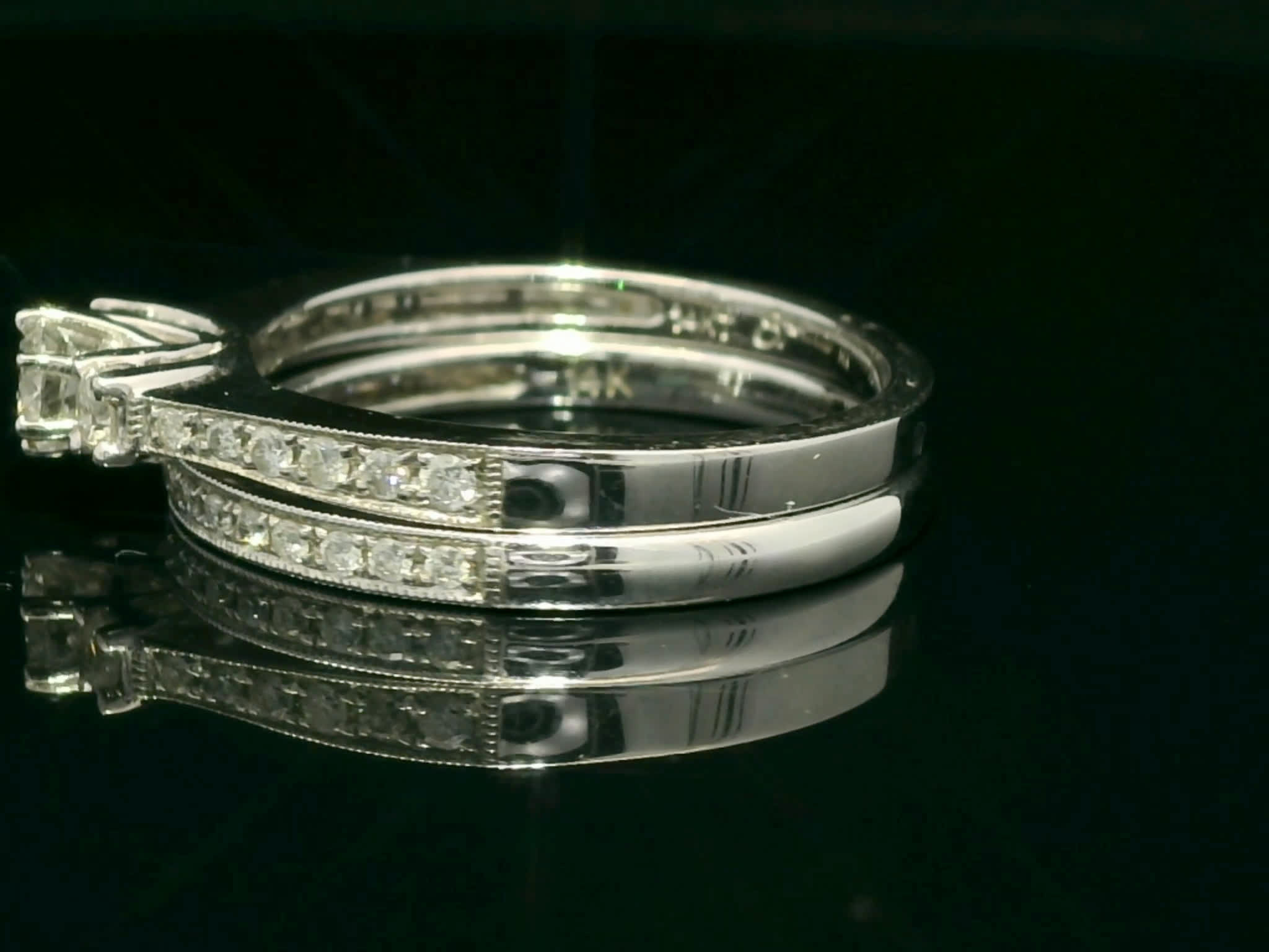 Round Brilliant Diamond Three-Stone Engagement Ring and Pavé Wedding Band Set