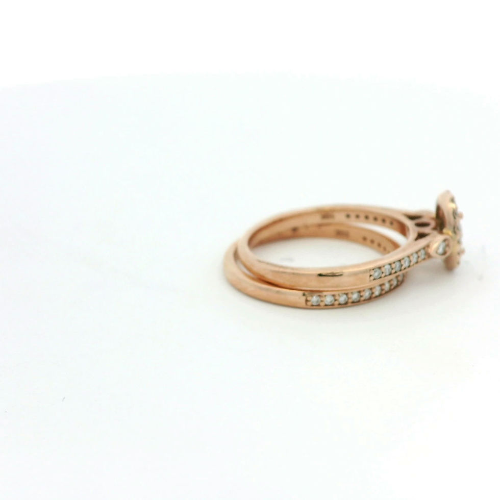 Thumbnail: Round Brilliant Diamond Halo Engagement Ring Set in Rose Gold
