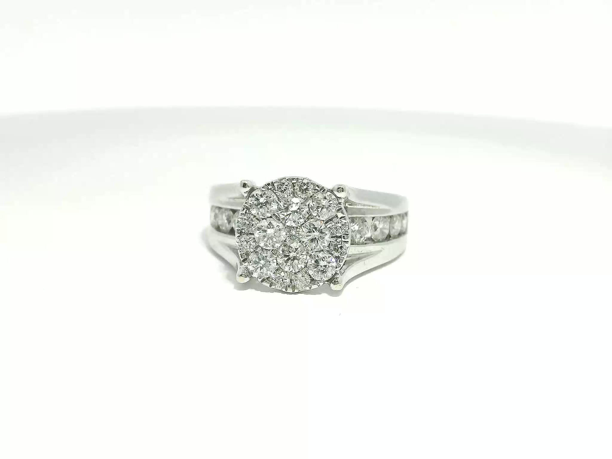 Round Brilliant Diamond Cluster Ring in White Gold with Channel-Set Shoulders
