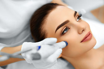 Face Skin Care. Close-up Of Woman Getting Facial Hydro Microdermabrasion Peeling Treatment