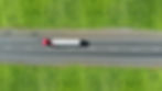 Fuel truck driving. Aerial view from dro