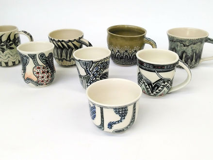 Eight decorated mugs finished