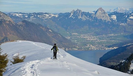 Snowshoe hiking above Lake Lucerne near Villa Tauris in Emmetten