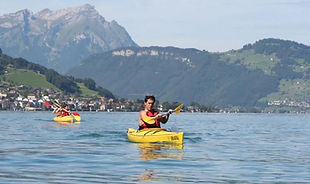 Kayaking on Lake Lucerne near Emmetten in Central Switzerland
