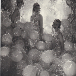 Young women surrounded by balloons