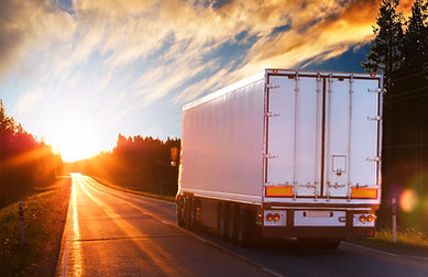 White Truck On The Asphalt Road In The Evening_edited.jpg
