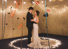 Bride with wing eyeliner, berry-toned lips, and an elegant soft flower embroidery wedding dress