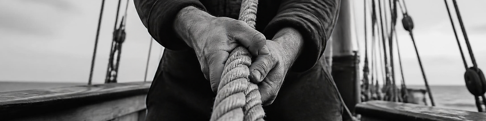 Black and white photo of rope and rigging on a traditional sailing ship