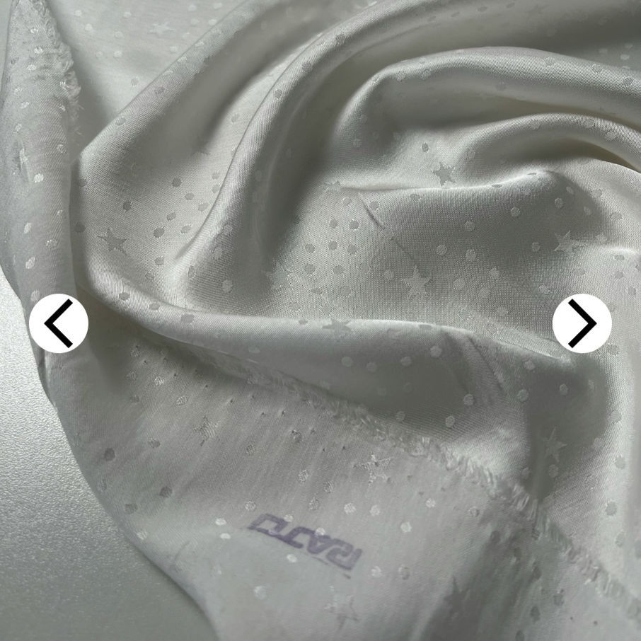 Italian pure viscose satin jacquard, almost white, stars and spots, per 0.5m