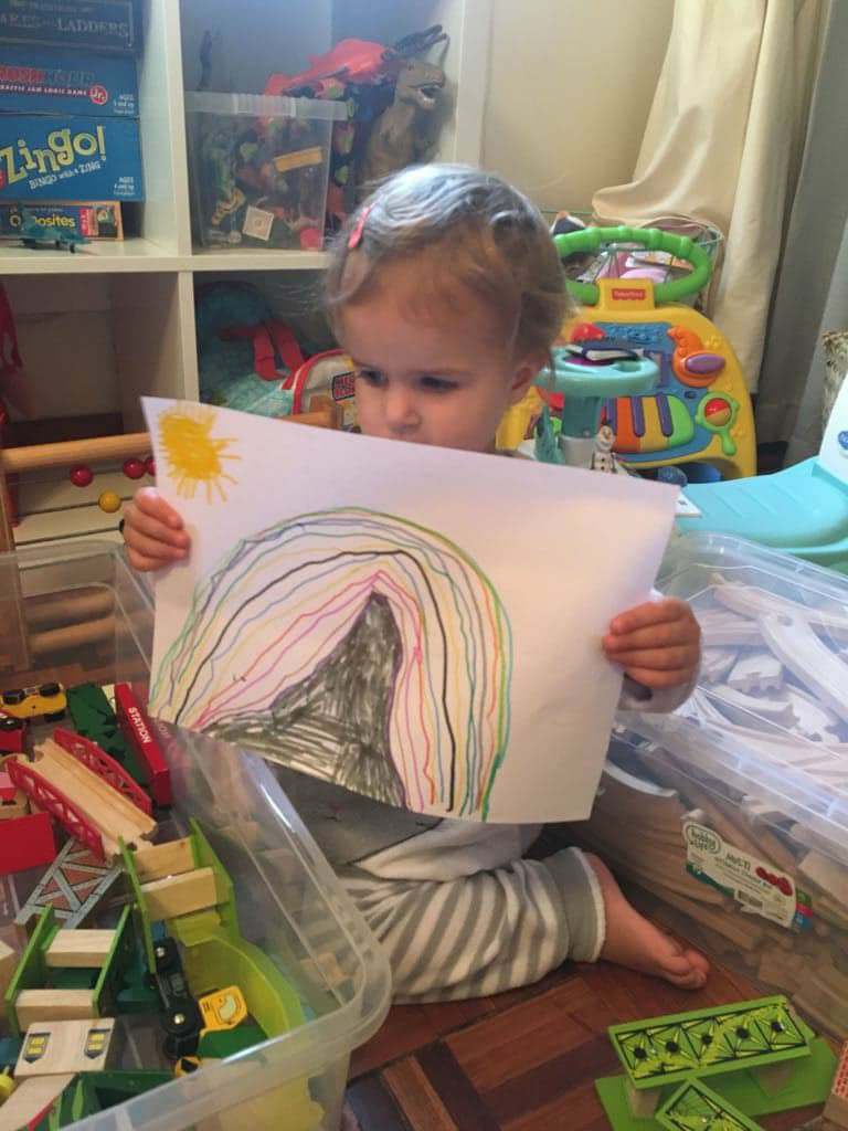 Josephine with a drawing by her brother, to thank all the beautiful people who have donated to help his little sister.