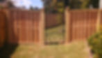 ornamental gate in wood privacy fence