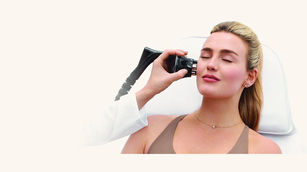 The triLift 2.0 DMSt applicator held against a client's cheek during a non-surgical facial muscle lift treatment at The Spa by Sheena in Lubbock, TX