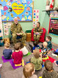 17 Wing leaders inspire young readers at MFRC Nursery School