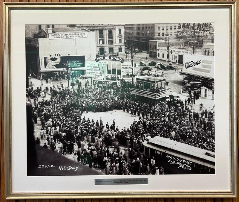 "Celebrating Victory of Europe at the corner of Portage Avenue and Main St, May 7, 1945, Photographer L.B.Foote" - City of Winnipeg Archives