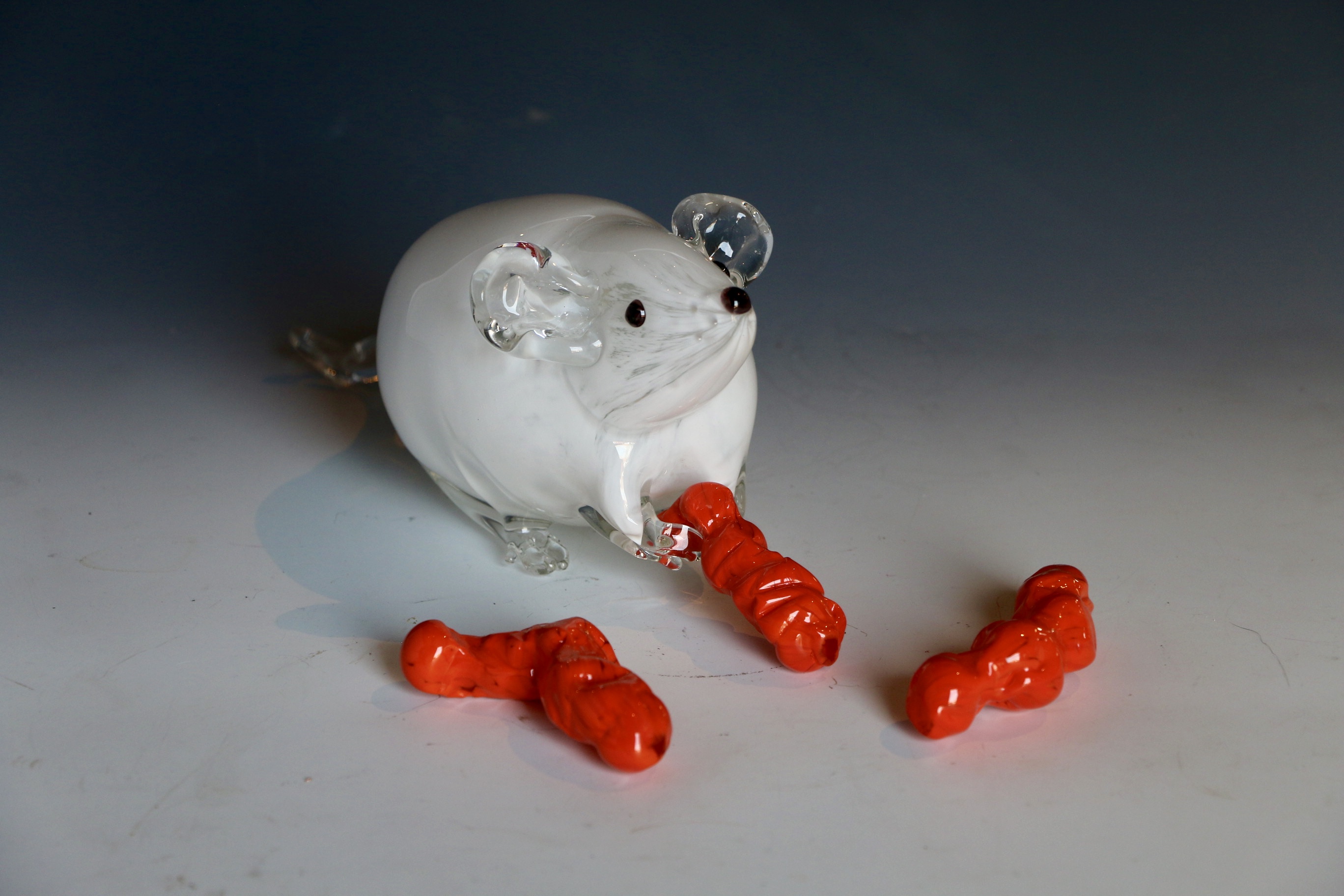 Blown glass mouse with cheetos