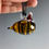 Thumbnail: Glass Bee Ornament with a Santa Hat
