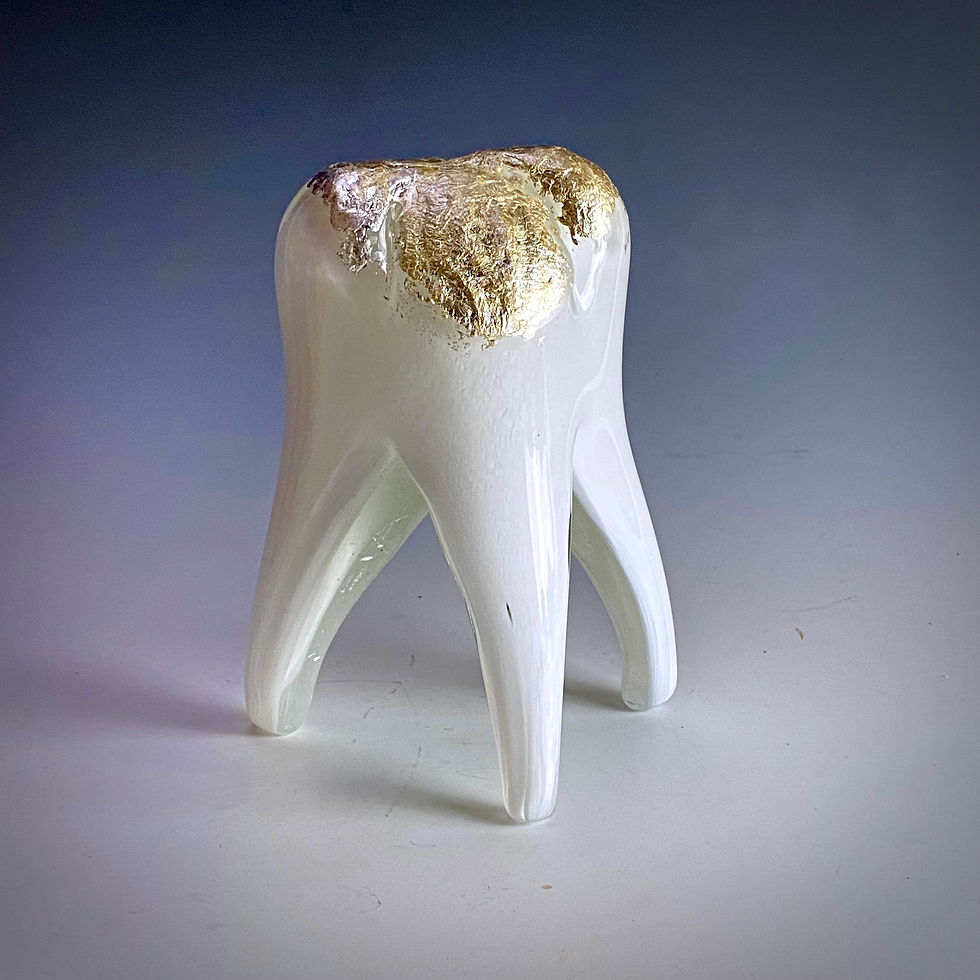 Hand Blown Glass Tooth with Silver Leaf Filling