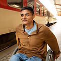 medium-shot-disabled-man-train-station.jpg