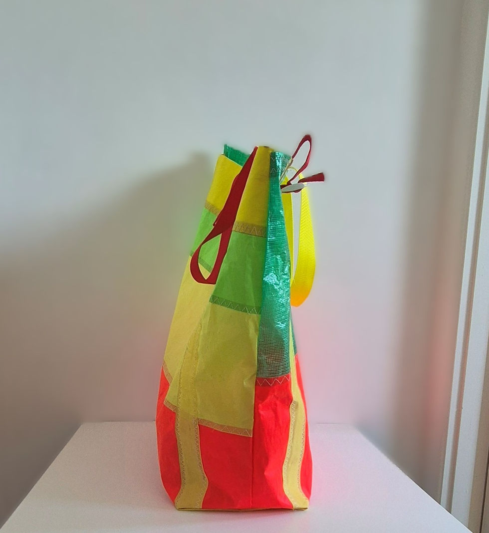 Thumbnail: Side of the bag where the seams are visible, close up to red hook and original features