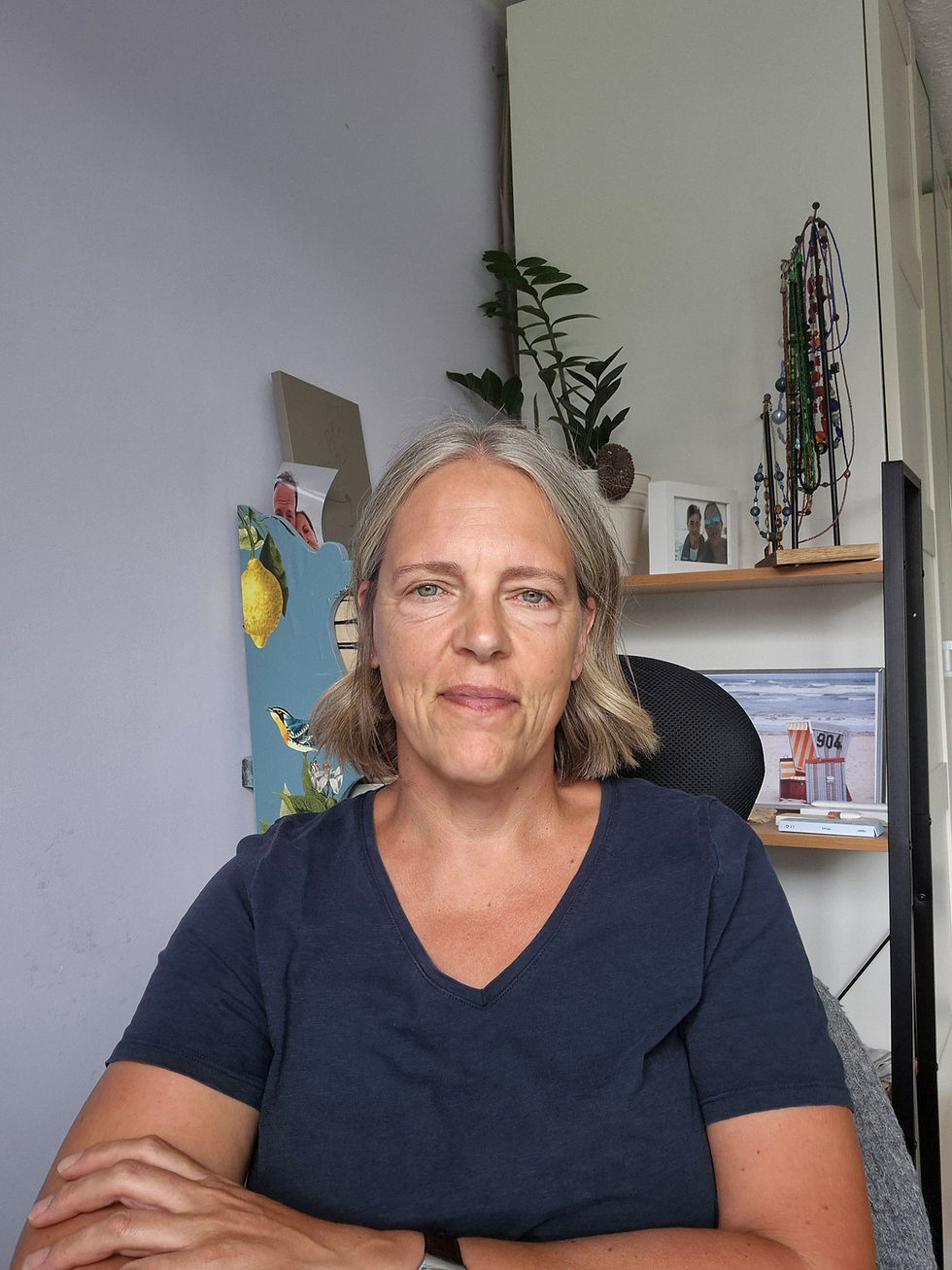 Person sitting in front of a shelf