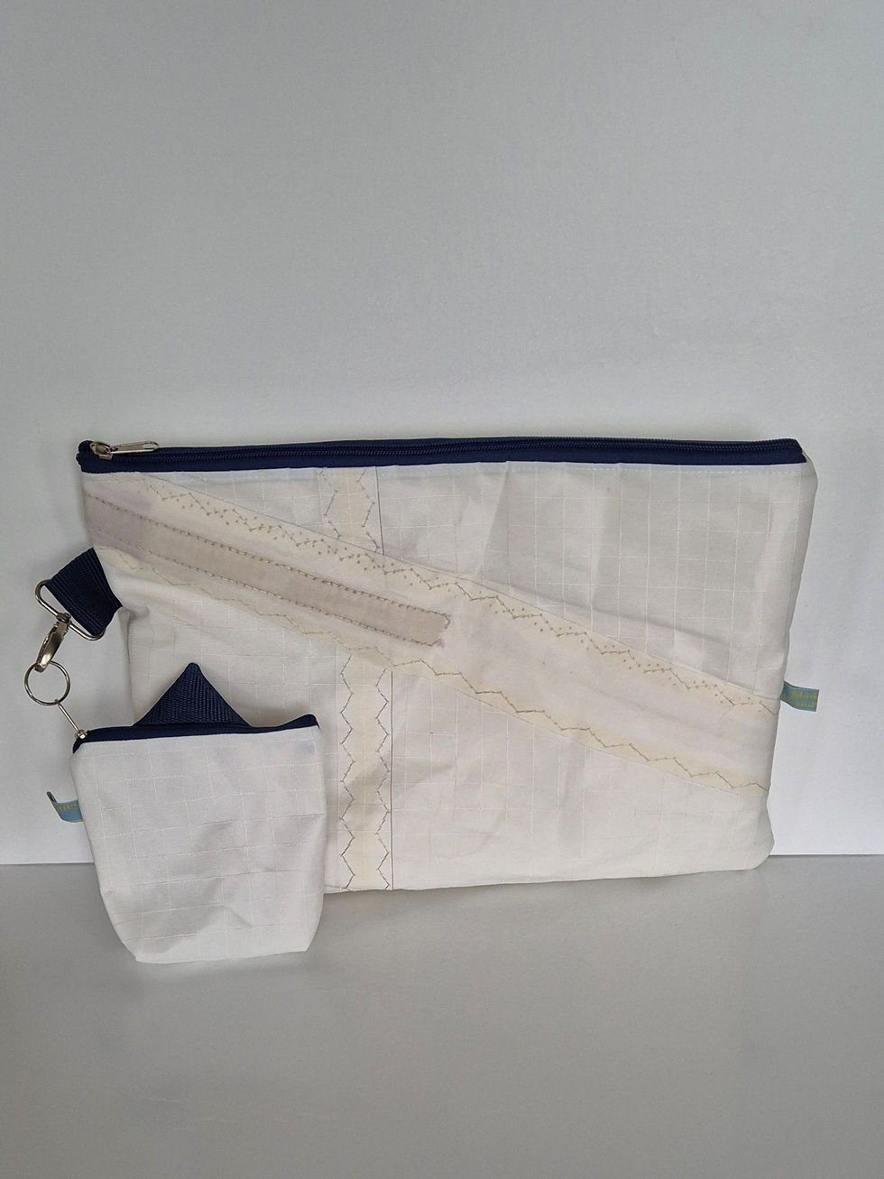 Thumbnail: Upcycled sailcloth laptop sleeve and matching small pouch