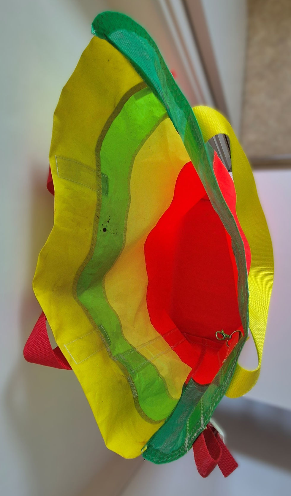 Thumbnail: Inside the bag is as the outside, the seams of the handles are visible as well as the hook with the keyring.