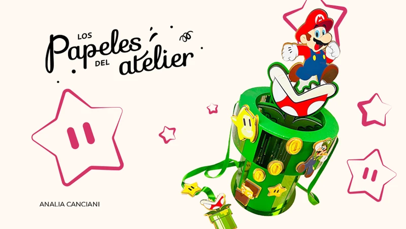 Piñata artesanal gigante de Mario Bros saliendo de un tubo verde con planta carnívora e iluminación