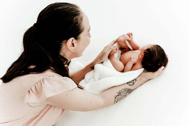 Fotografin bei der Arbeit mit Baby