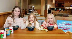 Morrisons has partnered with Kellogg’s to offer a free breakfast in its cafés during every 2026 school holiday. Here’s what’s included, who can claim it, and how it works alongside Kids Eat Free.